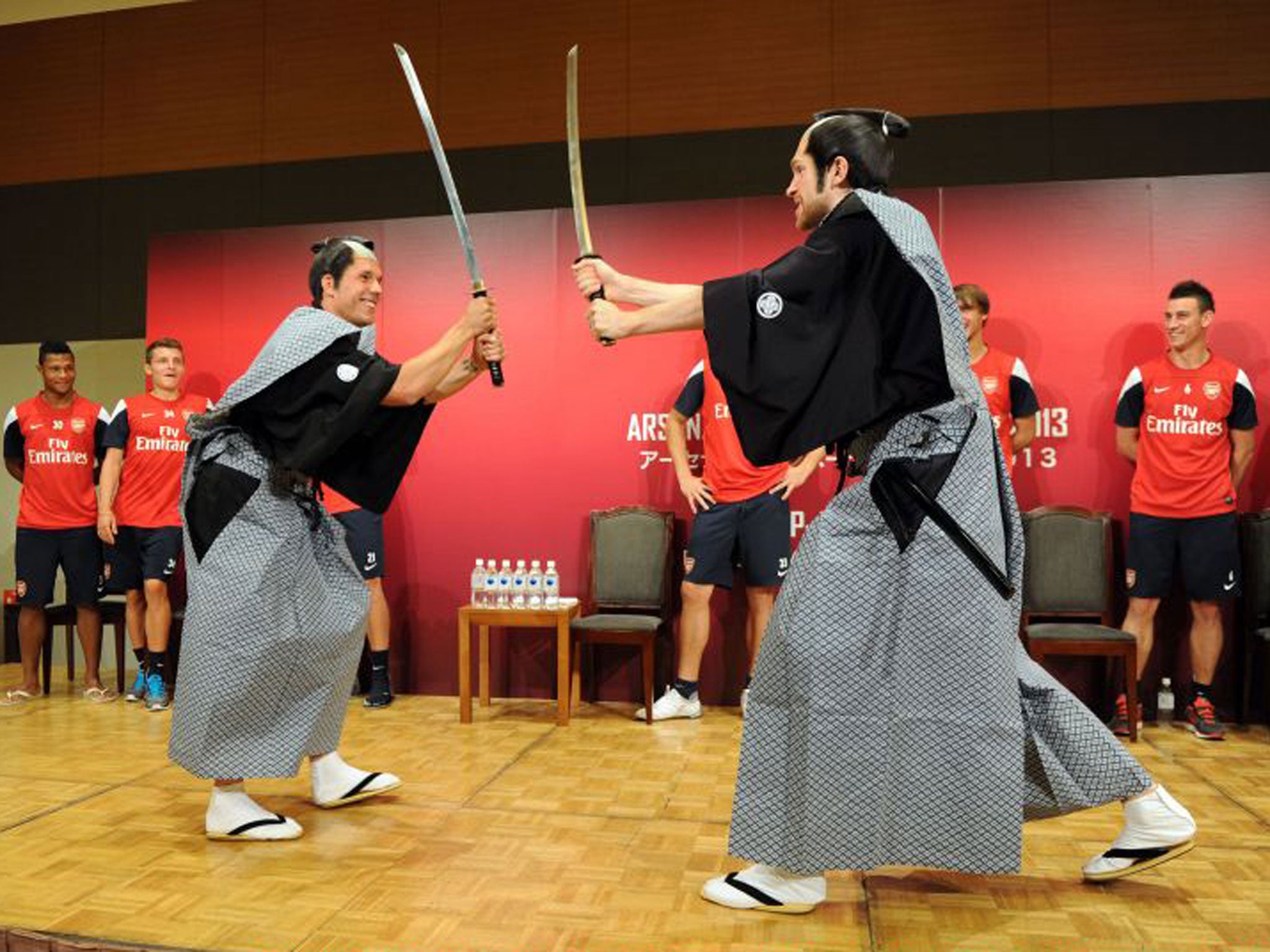 Lukas Podolski and Per Mertesacker pose as Samurai warriors on Arsenal’s pre-season tour of Japan