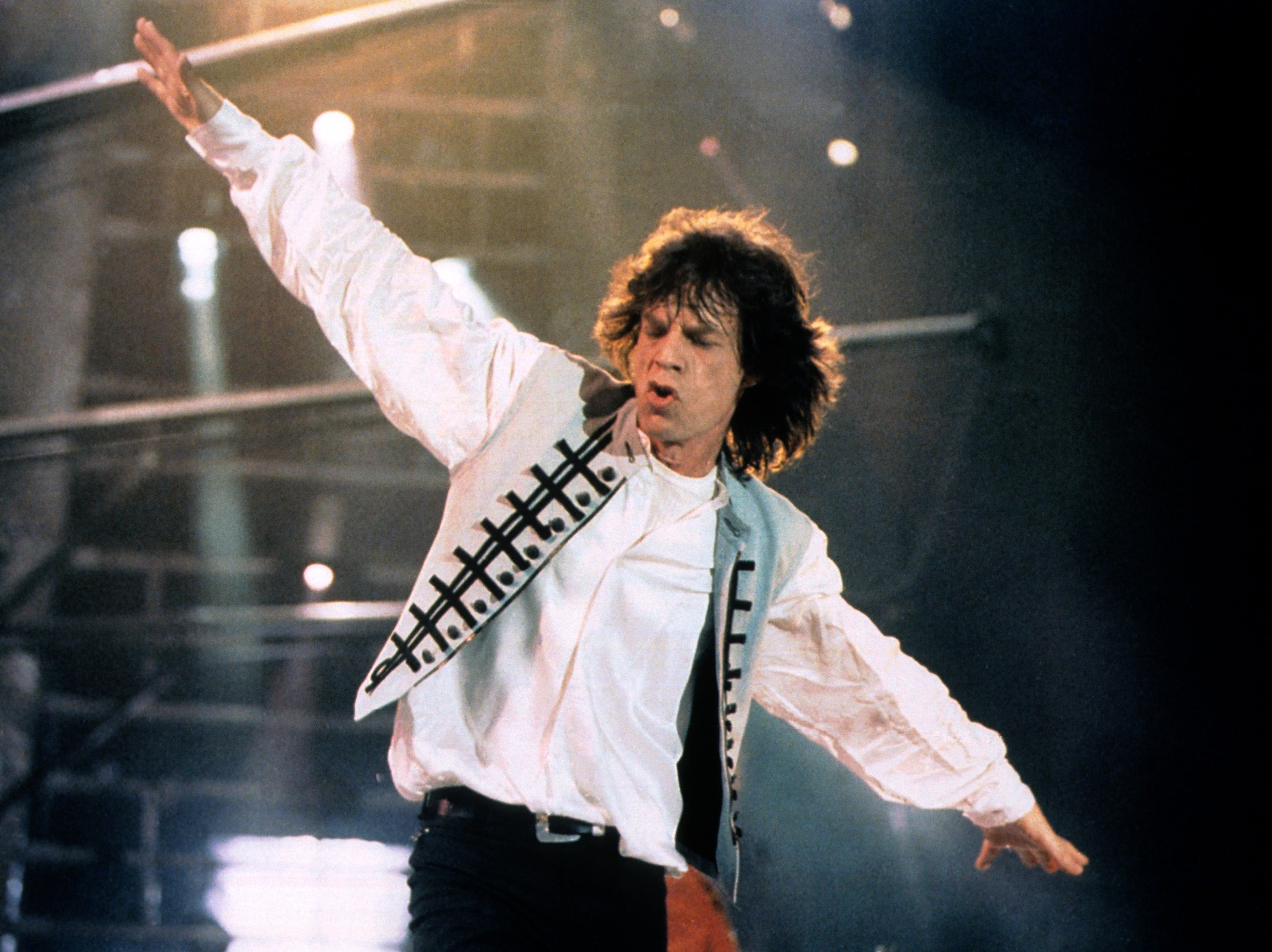 Jagger performing on stage as part of a 1995 Rolling Stones tour