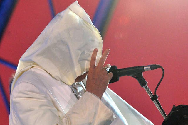 The wind blows Pope Francis's mantle as he speaks at Copacabana beach in Rio de Janeiro