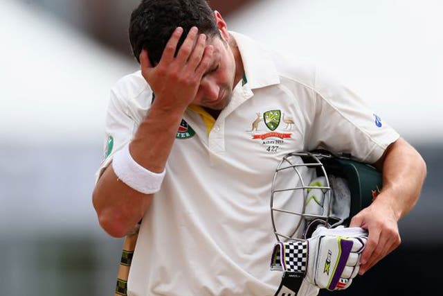 Ed Cowan of Australia looks dejected after being dismissed by Lewis Hatchett of Sussex