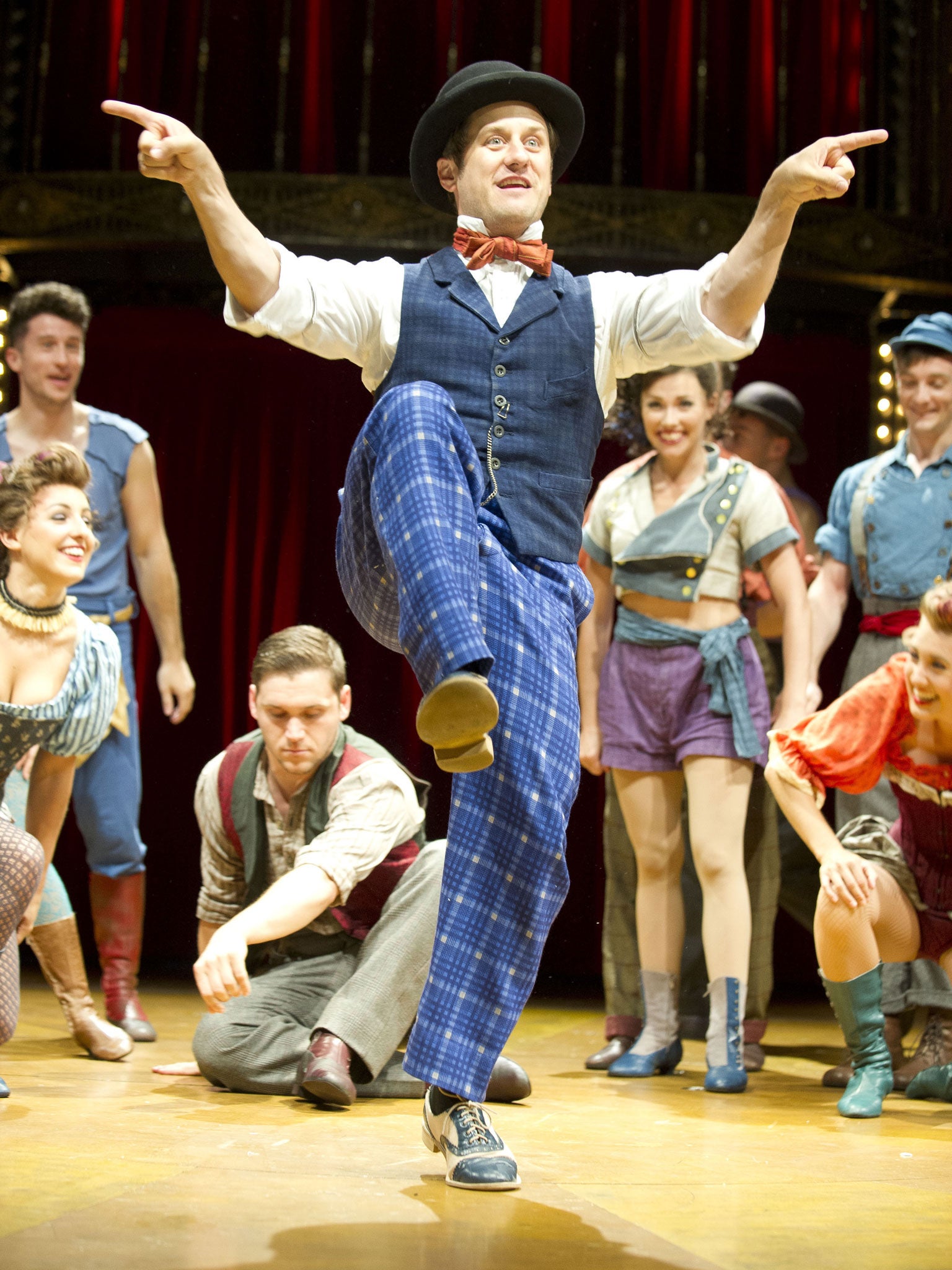 Knees-up: Christopher Fitzgerald plays cheeky-chappie P T Barnum