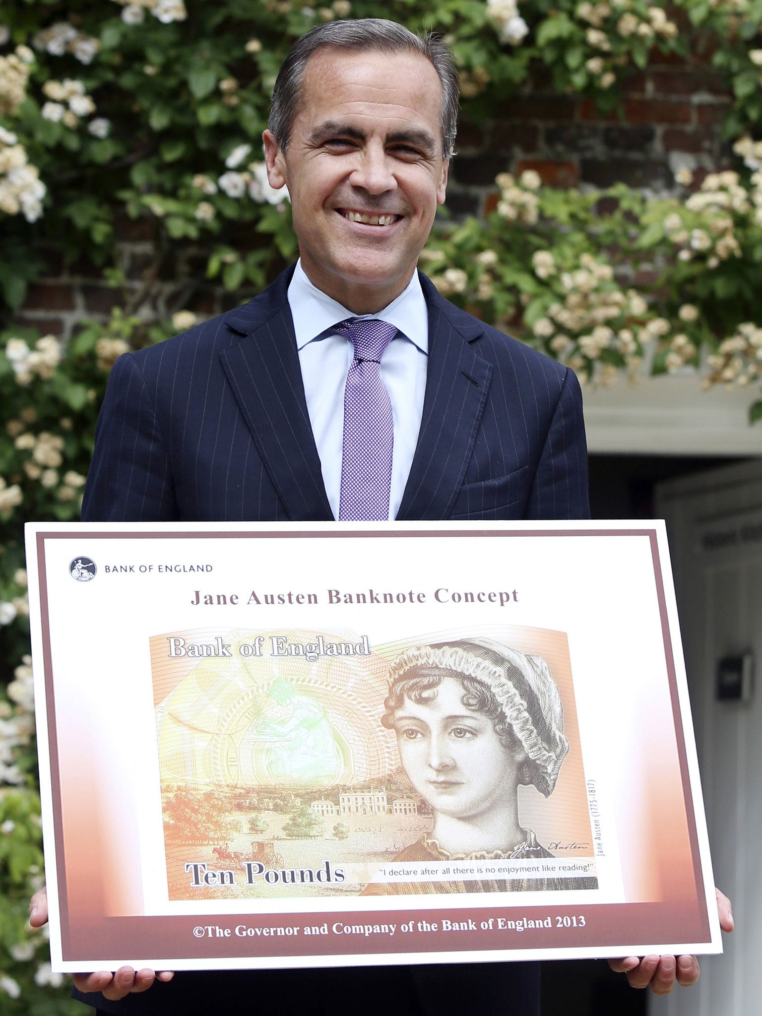 Mark Carney with the new £10 note