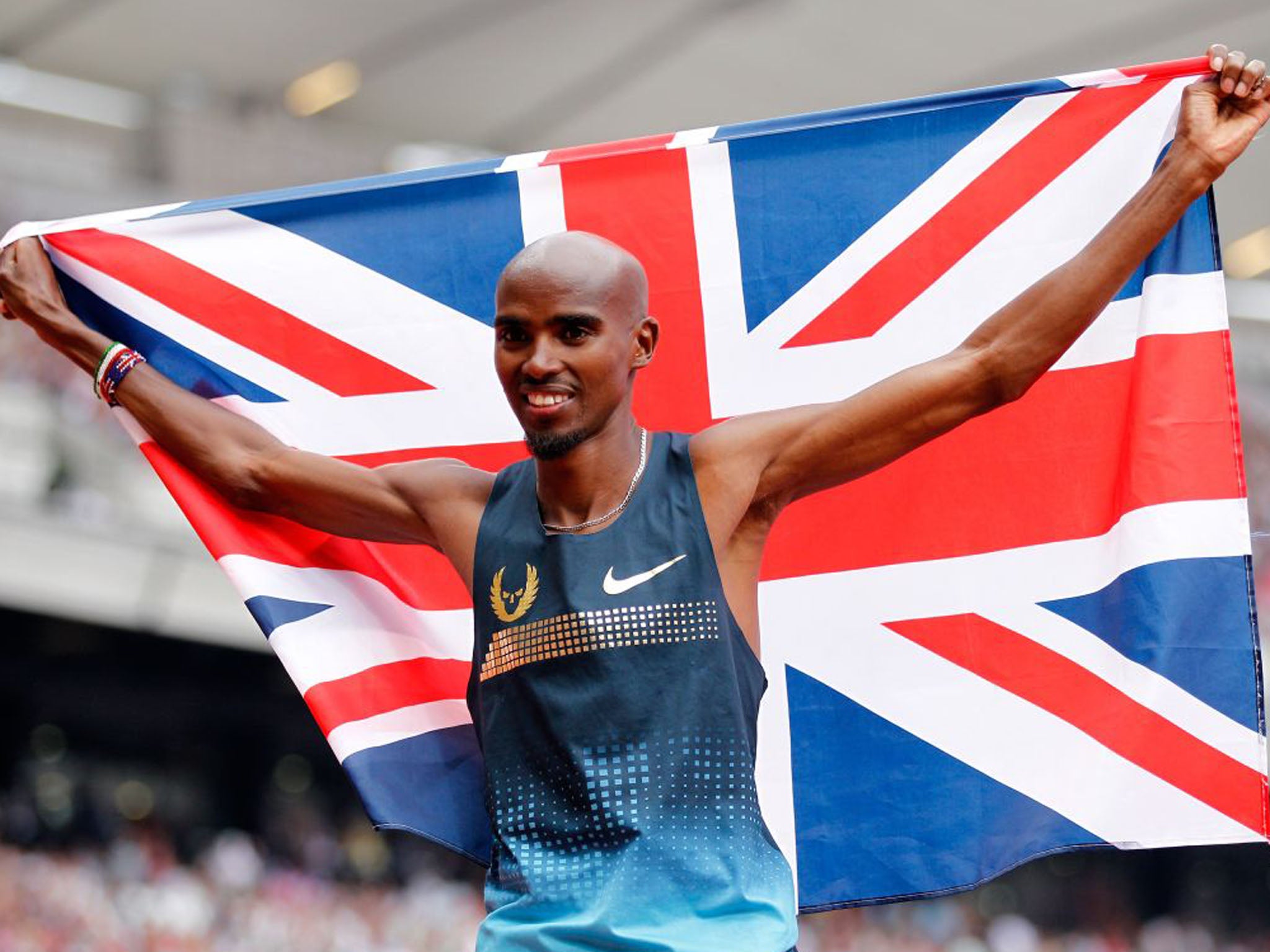 Farah celebrates after his win in the 3,000m, but he missed out on the British record over the distance