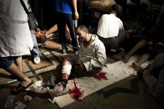A wounded Morsi supporter