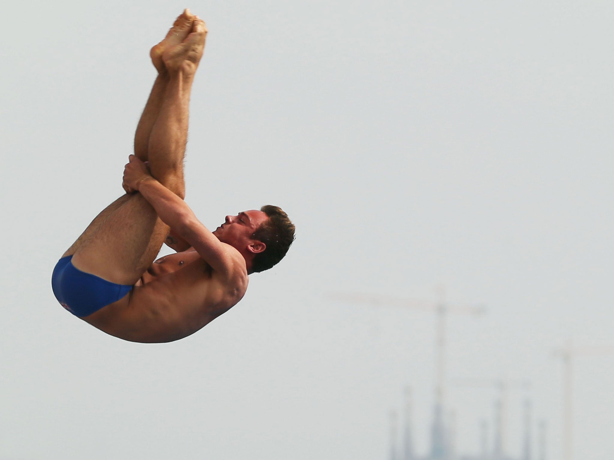 Final effort: The injured Tom Daley performs in front of a beautiful backdrop
