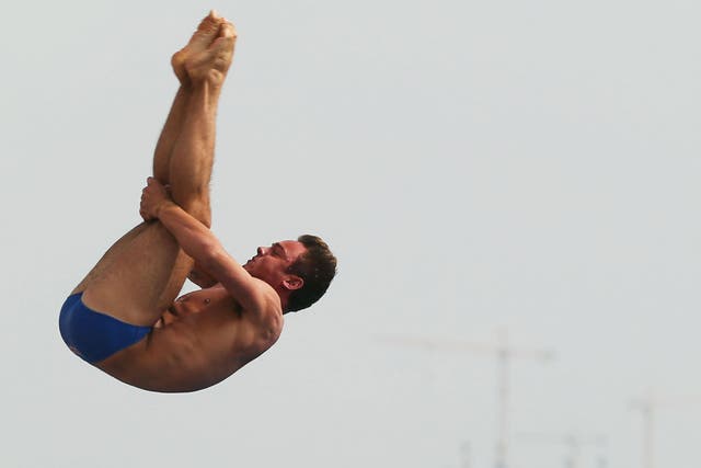 Final effort: The injured Tom Daley performs in front of a beautiful backdrop