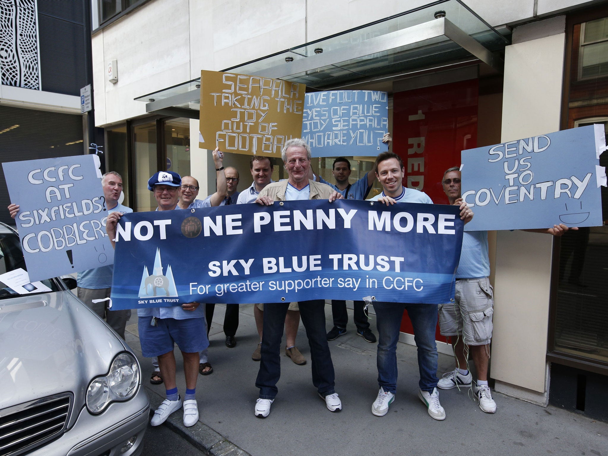 Worrying signs: Coventry City fans outside the club owners’ offices protest against the ground-share at Northampton