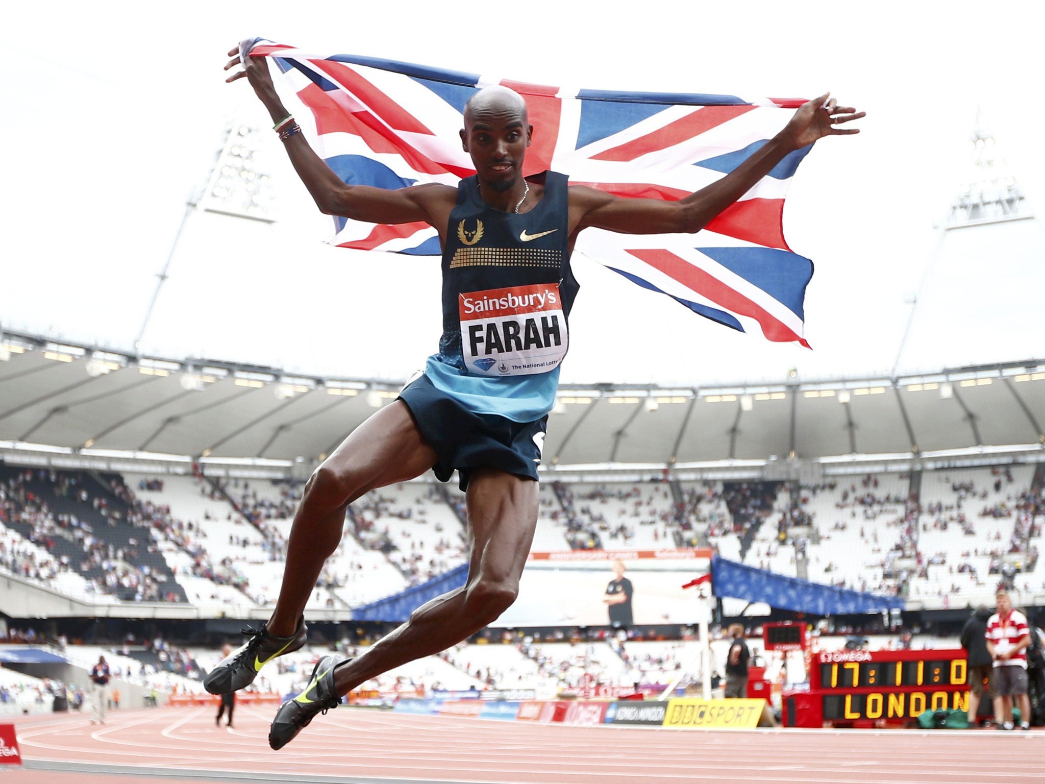 Fly Mo: Farah leaps for joy after winning the 3,000 metres at the Olympic Anniversary Games in London yesterday