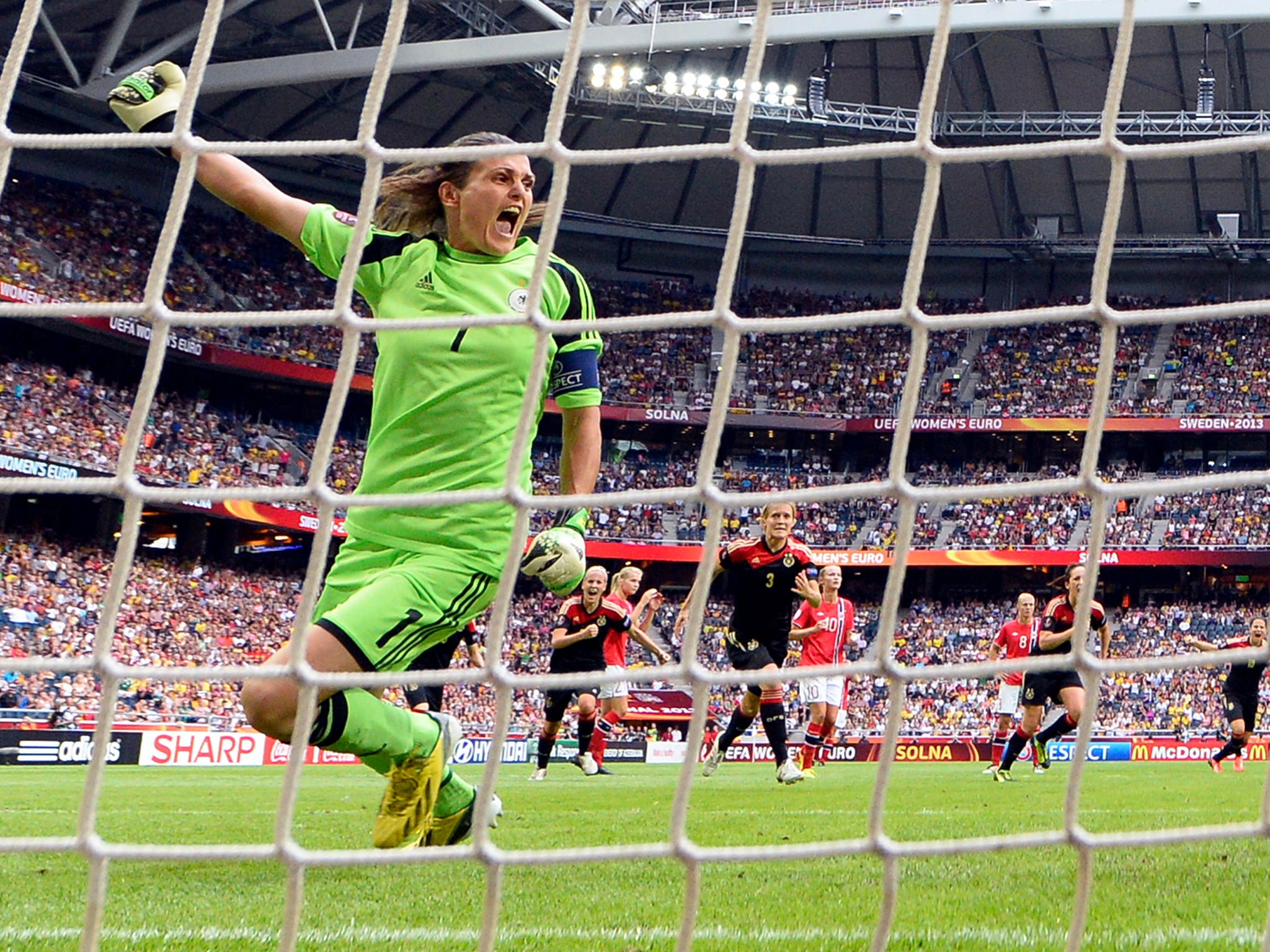 Germany's goalkeeper Nadine Angerer reacts after she saved a penalty shot during the UEFA Women's European Championship Euro 2013