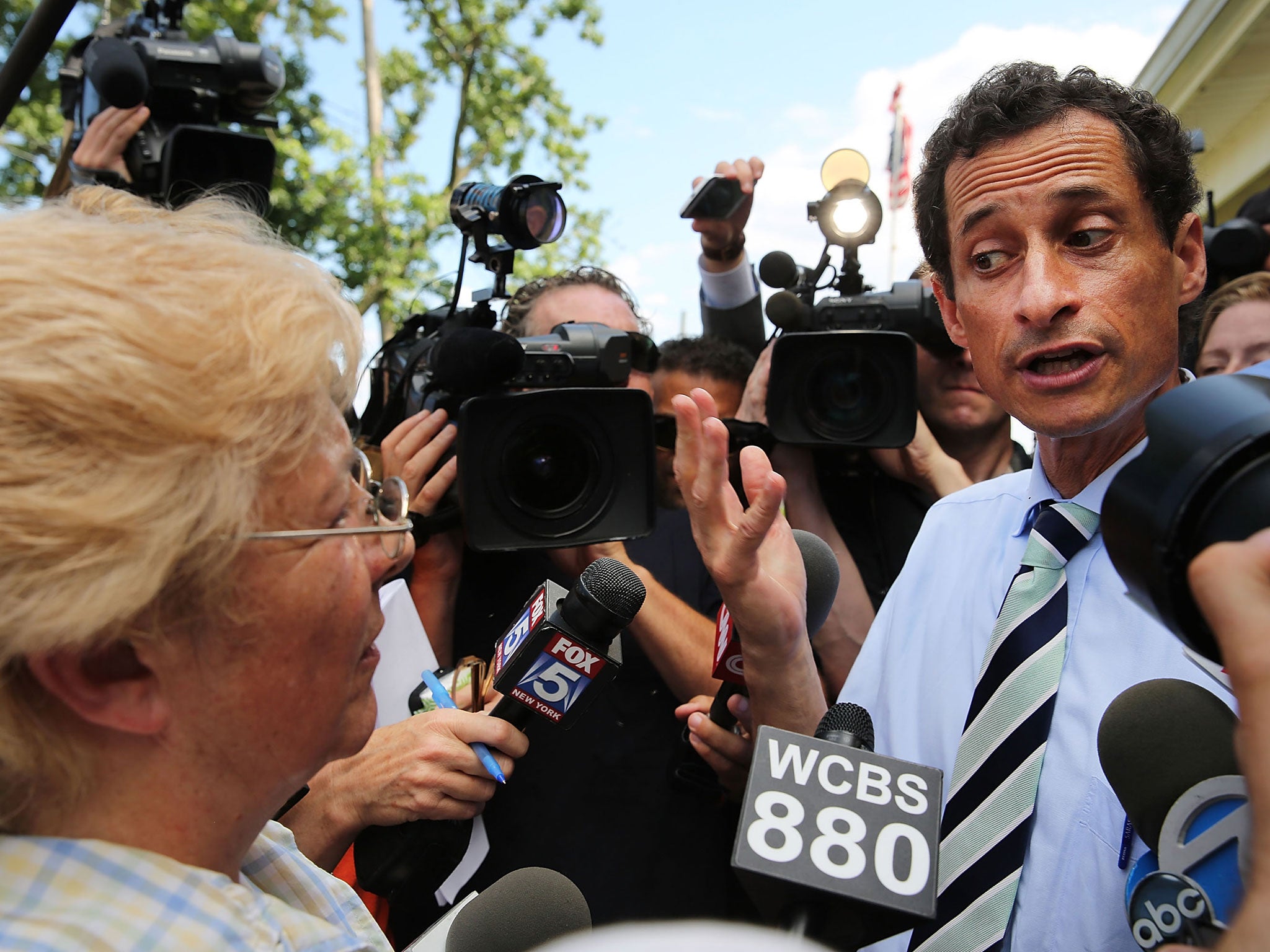 Anthony Weiner is confronted by a resident on Staten Island