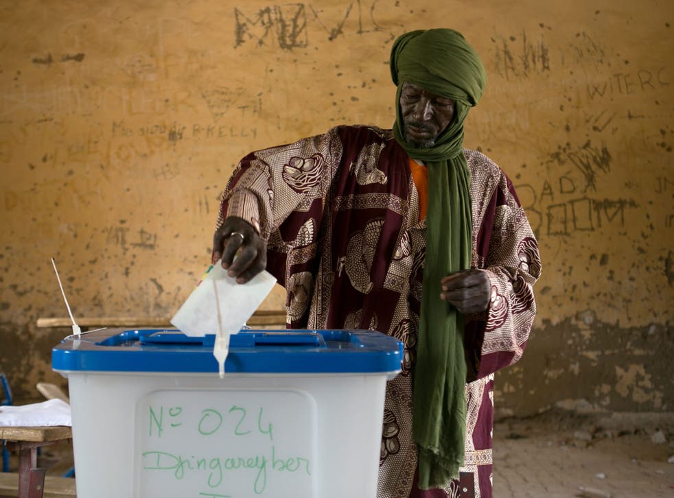 A man casting his vote for Mali’s next president in Timbuktu