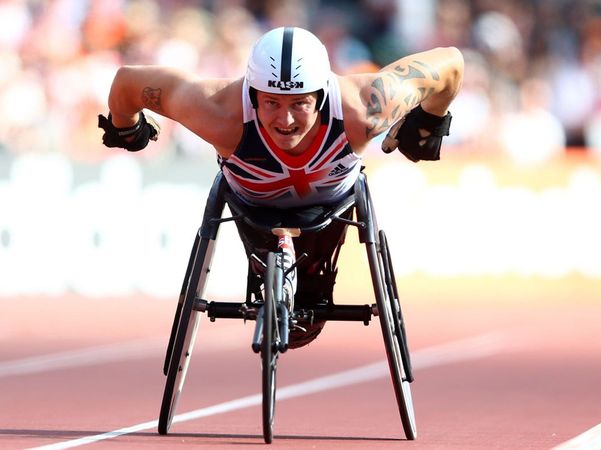 David Weir powered home 10 seconds ahead of the rest of the field in the final event of the day - as the huge crowd cheered him to the rafters