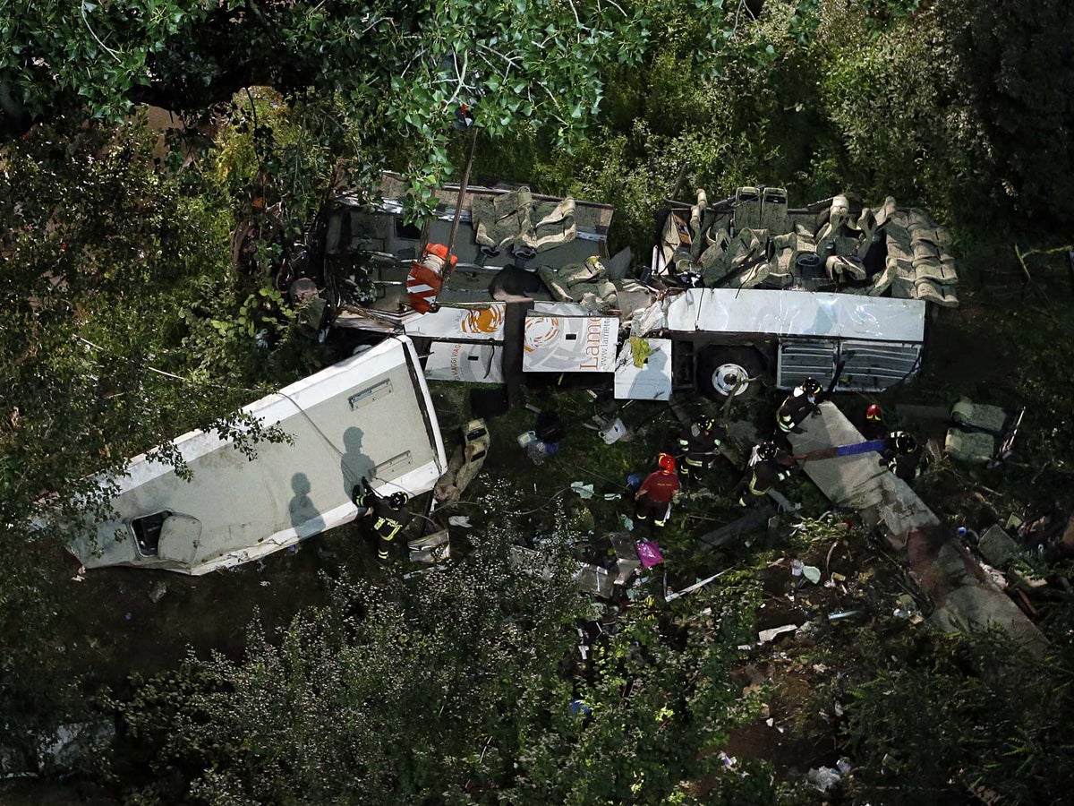 Italy bus crash: Burst tyre may have caused coach to plunge from viaduct,  killing at least 38 | The Independent | The Independent