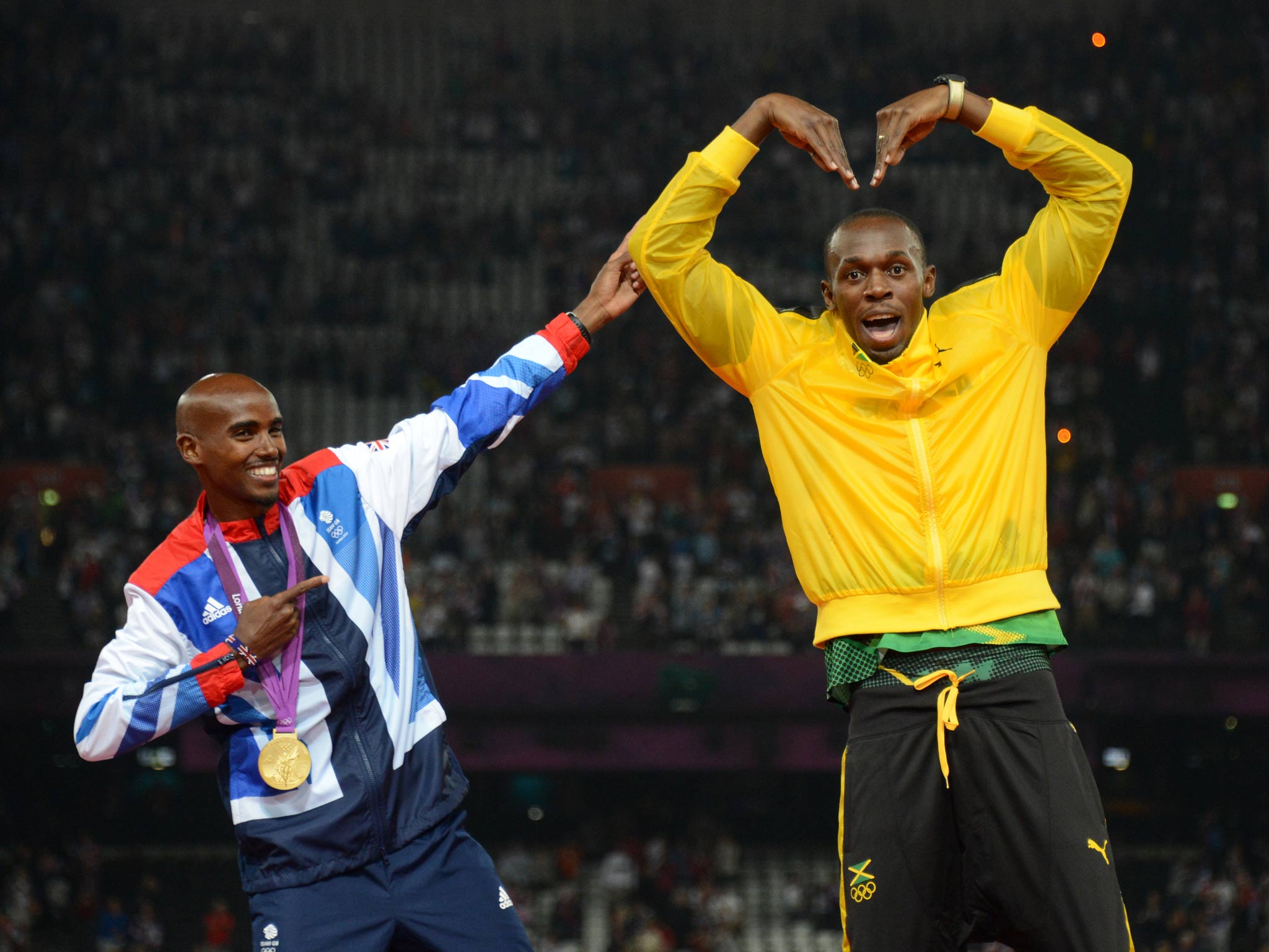 Usain Bolt and Mo Farah pictured at London 2012
