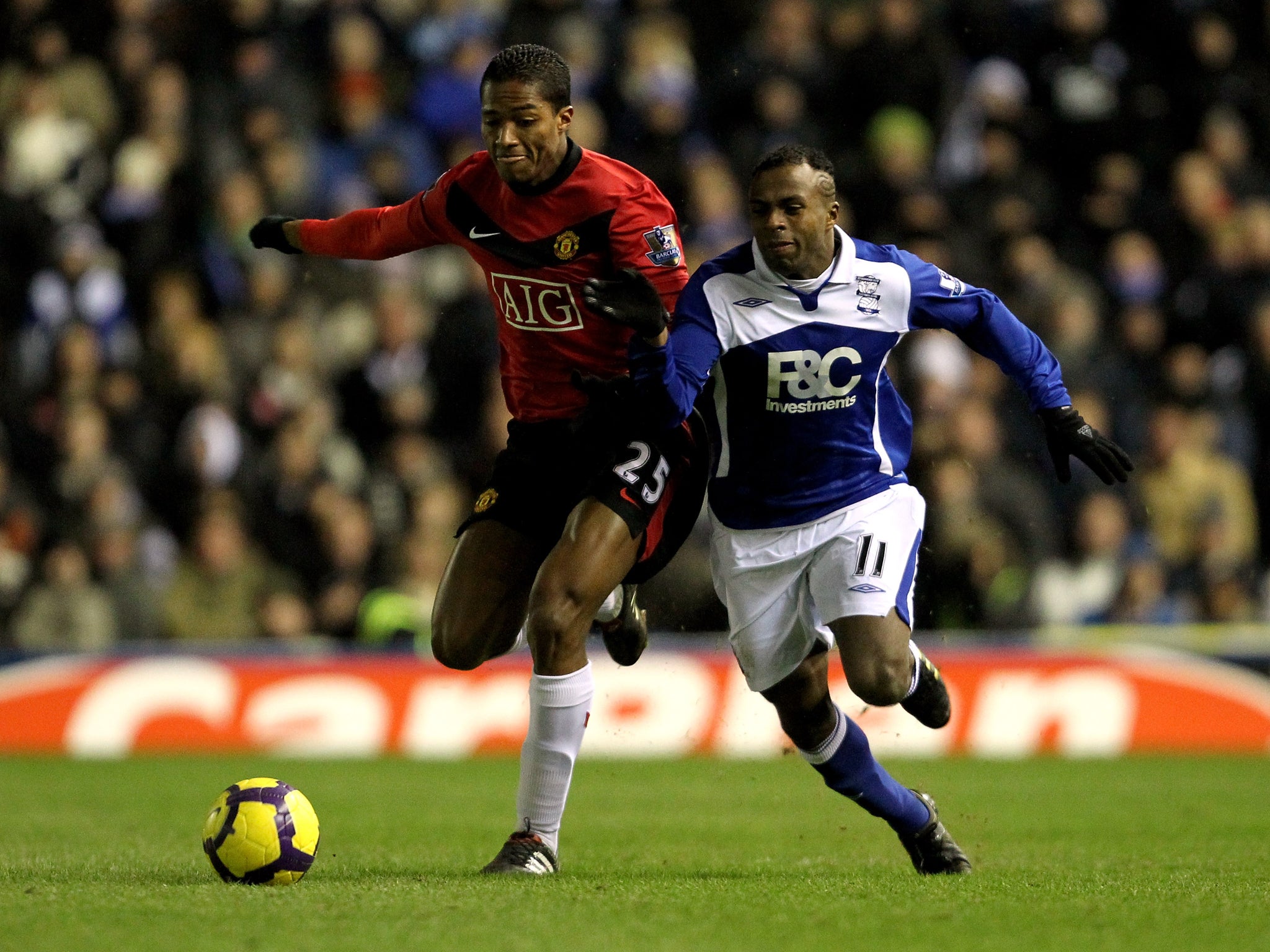 Christian Benitez (r) challenges his good friend and international teammate Antonio Valencia (l) in 2010