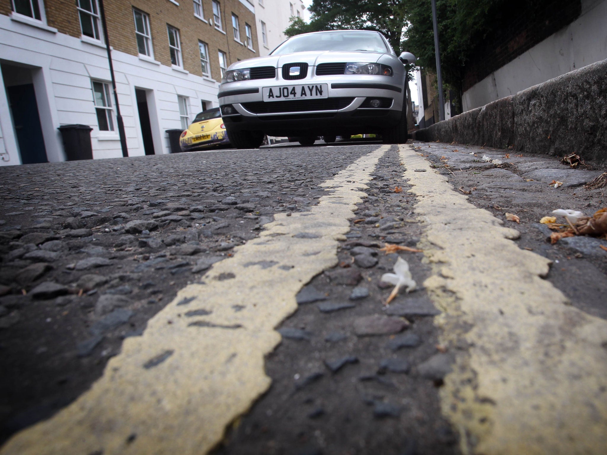 Eliminating double yellow lines is intended to help rejuvenate Britain's high streets