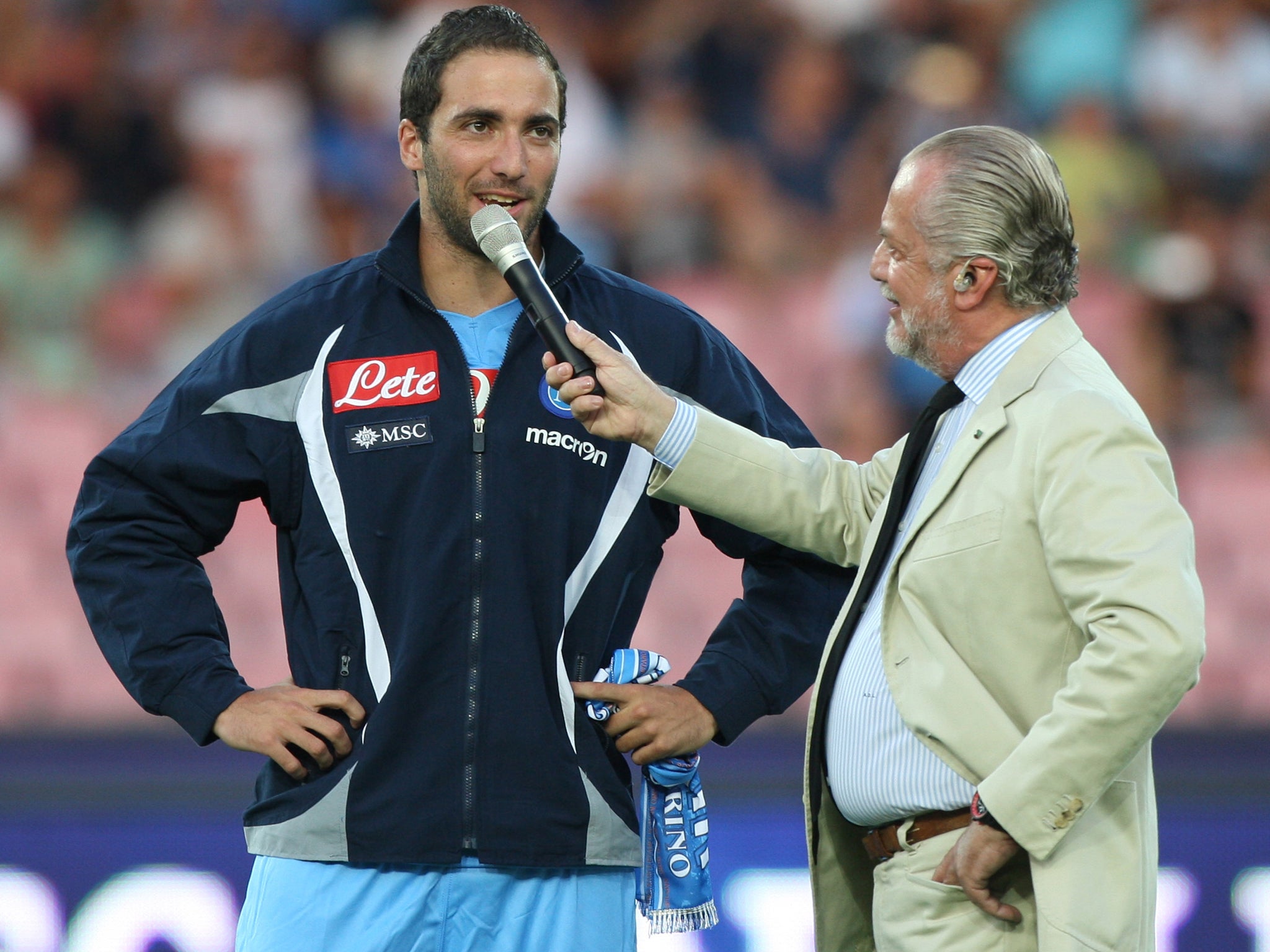 New signing Gonzalo Higuain is introduced by outspoken club president Aurelio De Laurentiis, after the striker is unveiled following the completion of his £34.5m move from Real Madrid.