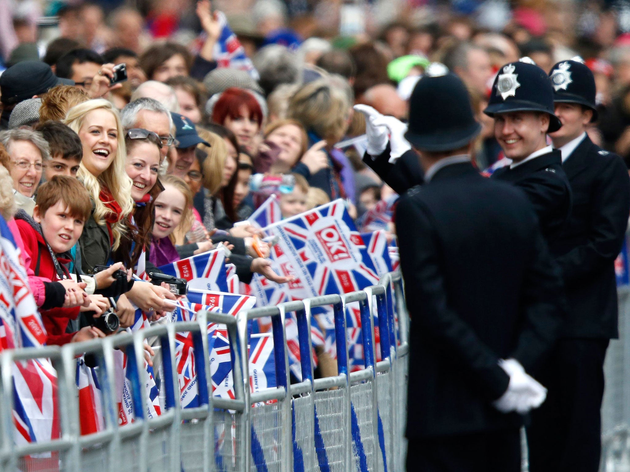 The Government says people in the UK are slightly happier in 2013 because of the Olympics and Diamond Jubilee celebrations