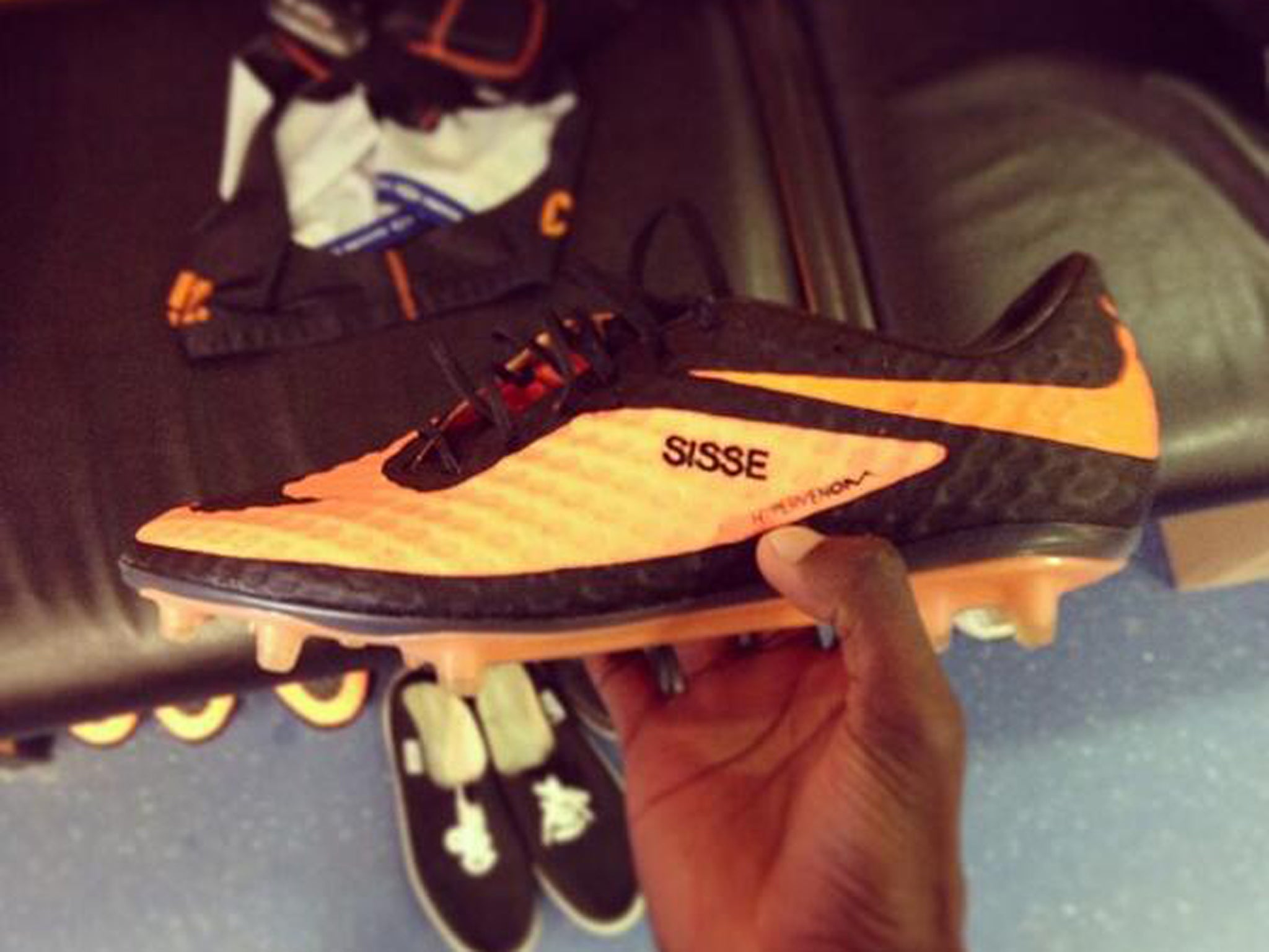 Papiss Cisse's new Nike football boots with the incorrect spelling