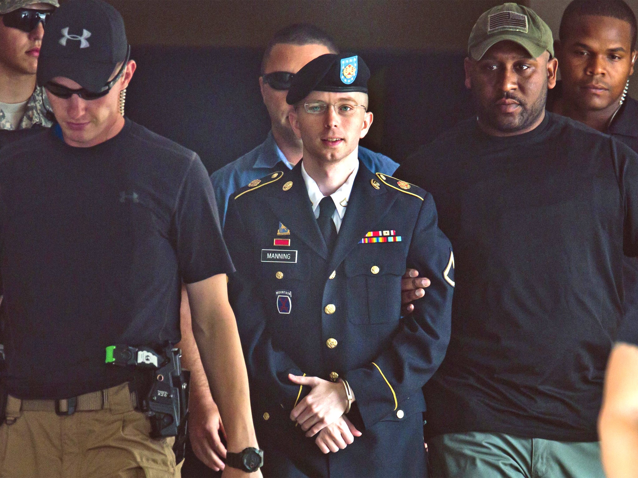 Bradley Manning leaves the courtroom at Fort Meade, Maryland