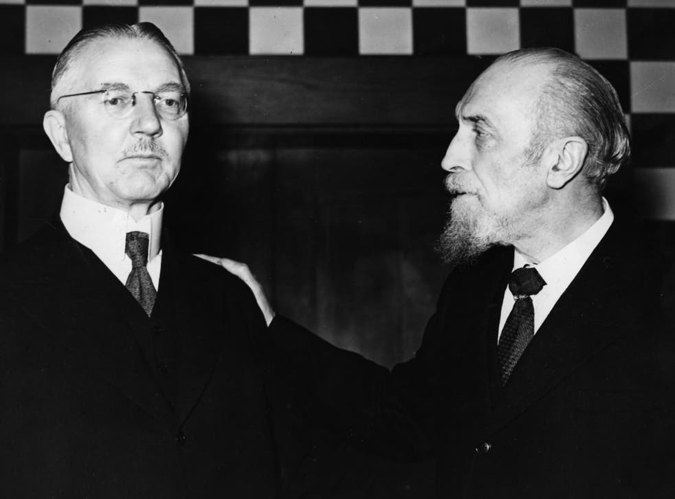 Montagu Collet Norman (right), Governor of the Bank of England from 1920 to 1944, talks with Hjalmar Schacht , German financier and Hitler's minister of economics in around 1935