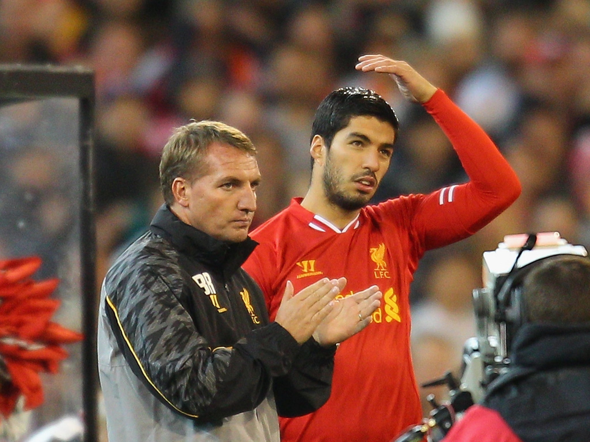 Brendan Rodgers insists Luis Suarez understands why Liverpool are refusing to sell him to Arsenal