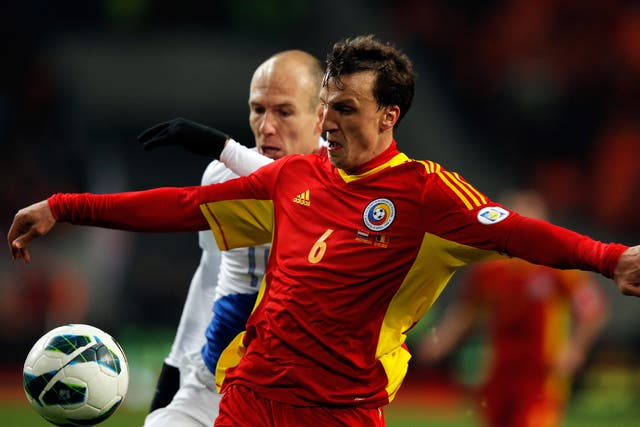 Vlad Chiriches, in action for Steaua Bucharest agains Arjen Robben of Bayern Munich, has been linked with a move to Tottenham