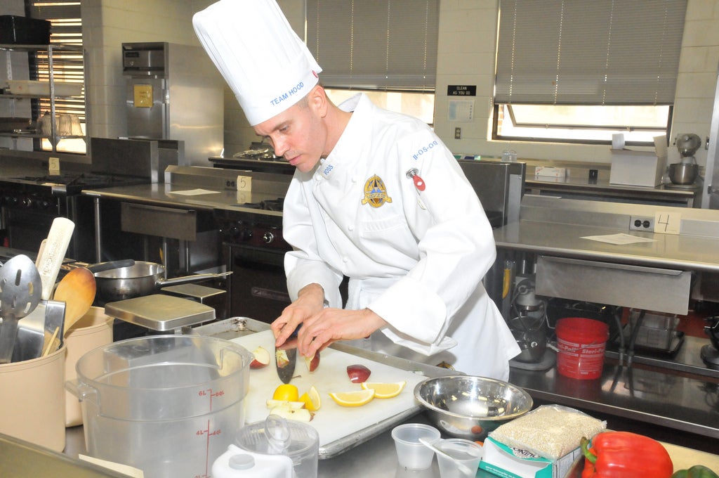 A chef practises some culinary art