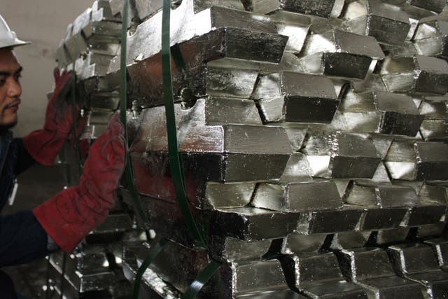 January 24, 2012A worker makes a final check of refined tin ahead of shipment in a warehouse owned by a private company in Indonesia's Bangka-Belitung province January 16, 2012. REUTERS/Dwi Sadmoko