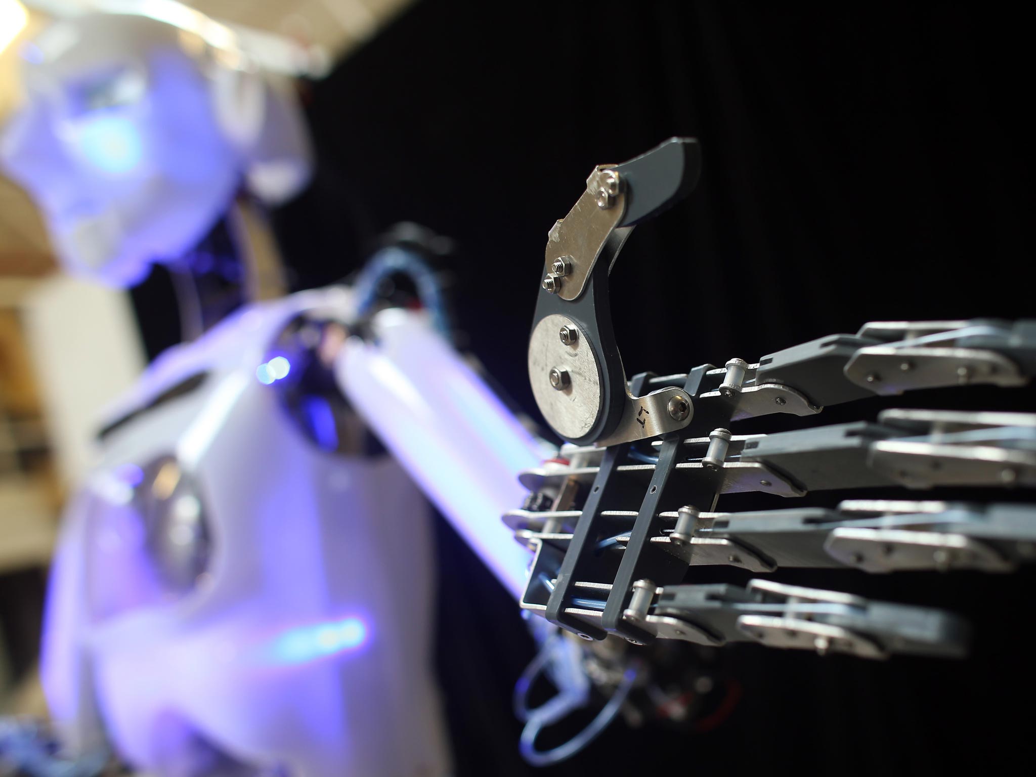 A nearly completed RoboThespian robot inside the Engineered Arts workshop is tested