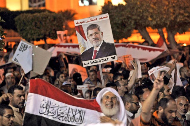 Egyptian supporters of Morsi protest in Cairo