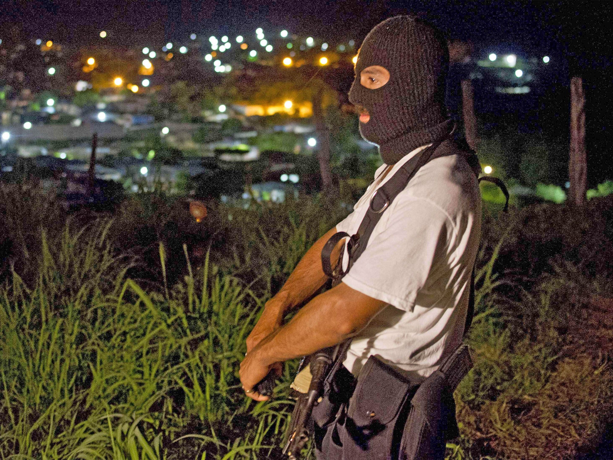 A member of the newly formed citizens' self-protection defence force on patrol
