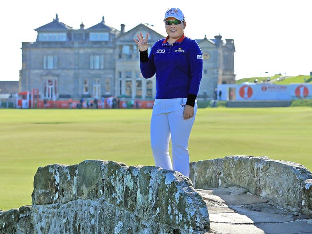 Inbee Park, of South Korea, stands on the Old Course at St Andrews, where she will begin her attempt at a fourth major this year