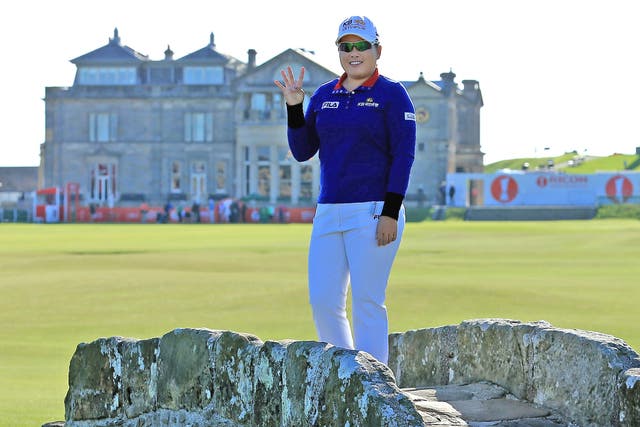Inbee Park, of South Korea, stands on the Old Course at St Andrews, where she will begin her attempt at a fourth major this year