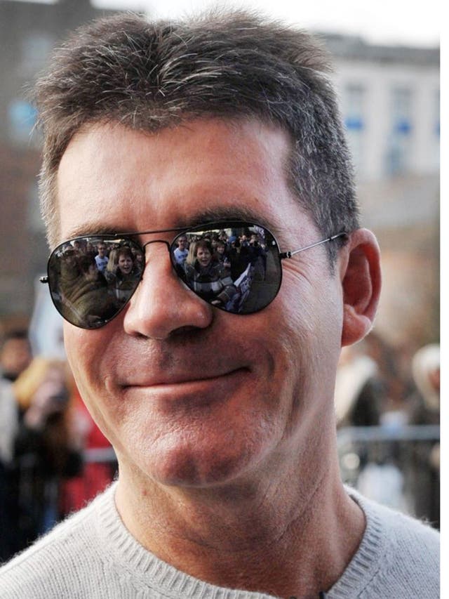 Simon Cowell is reportedly expecting his first child with Lauren Silverman 