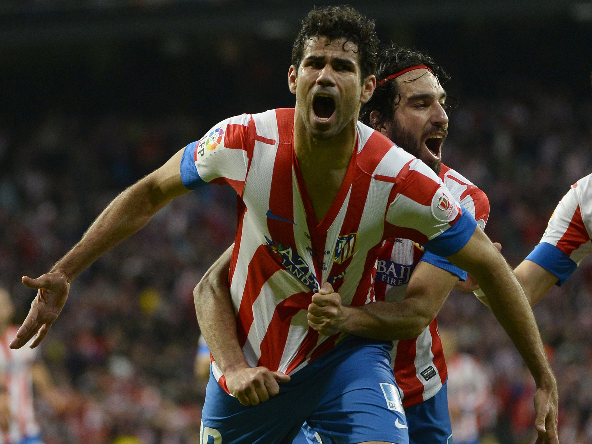 Diego Costa celebrates scoring for Atletico Madrid