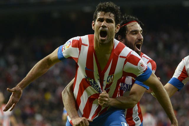 Diego Costa celebrates scoring for Atletico Madrid