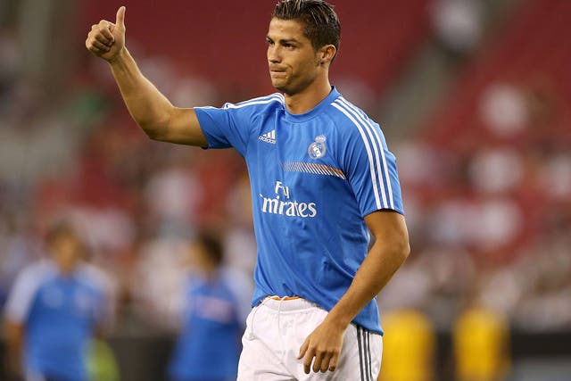 Cristiano Ronaldo acknowledges the fans as Real Madrid play LA Galaxy