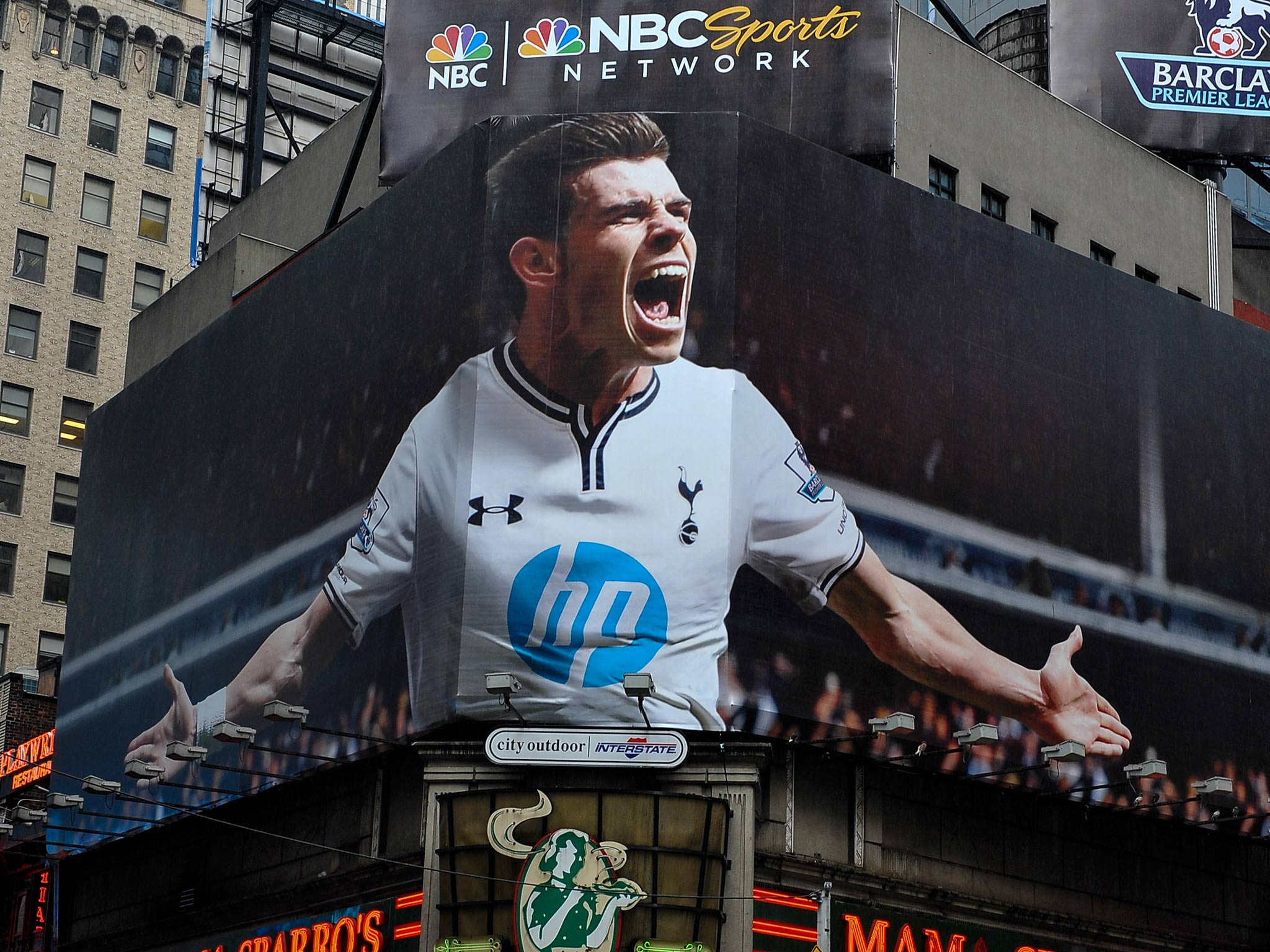 A huge image of Bale has gone up in Time Square, New York