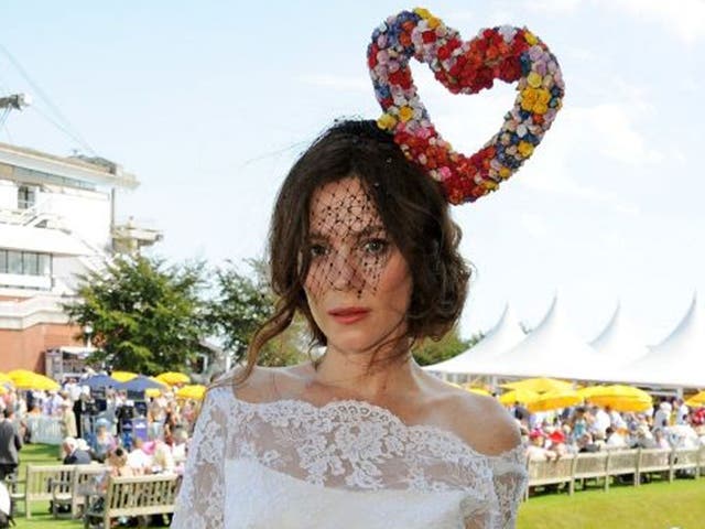 Is Anna Friel utterly in love? The British actress wore a striking heart-shaped hat made of colourful flowers and veil by London-based milliner Victoria Grant for the Glorious Goodwood at Goodwood Racecourse, Chichester