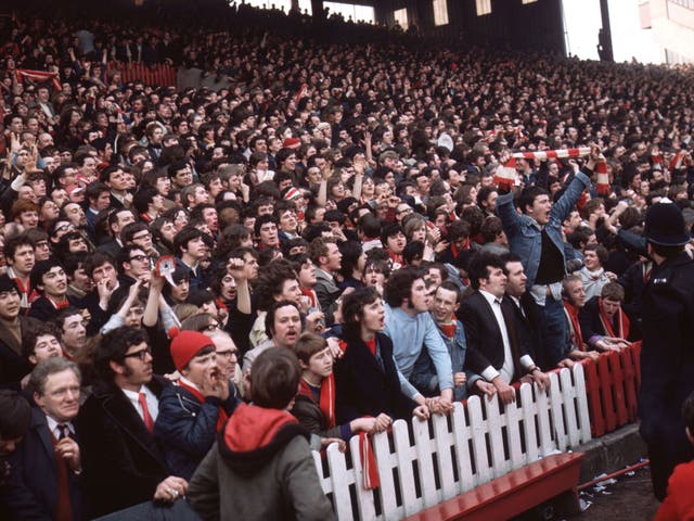 1971: Supporters of Liverpool FC on the terraces during a semi-final match against Everton in the FA cup.