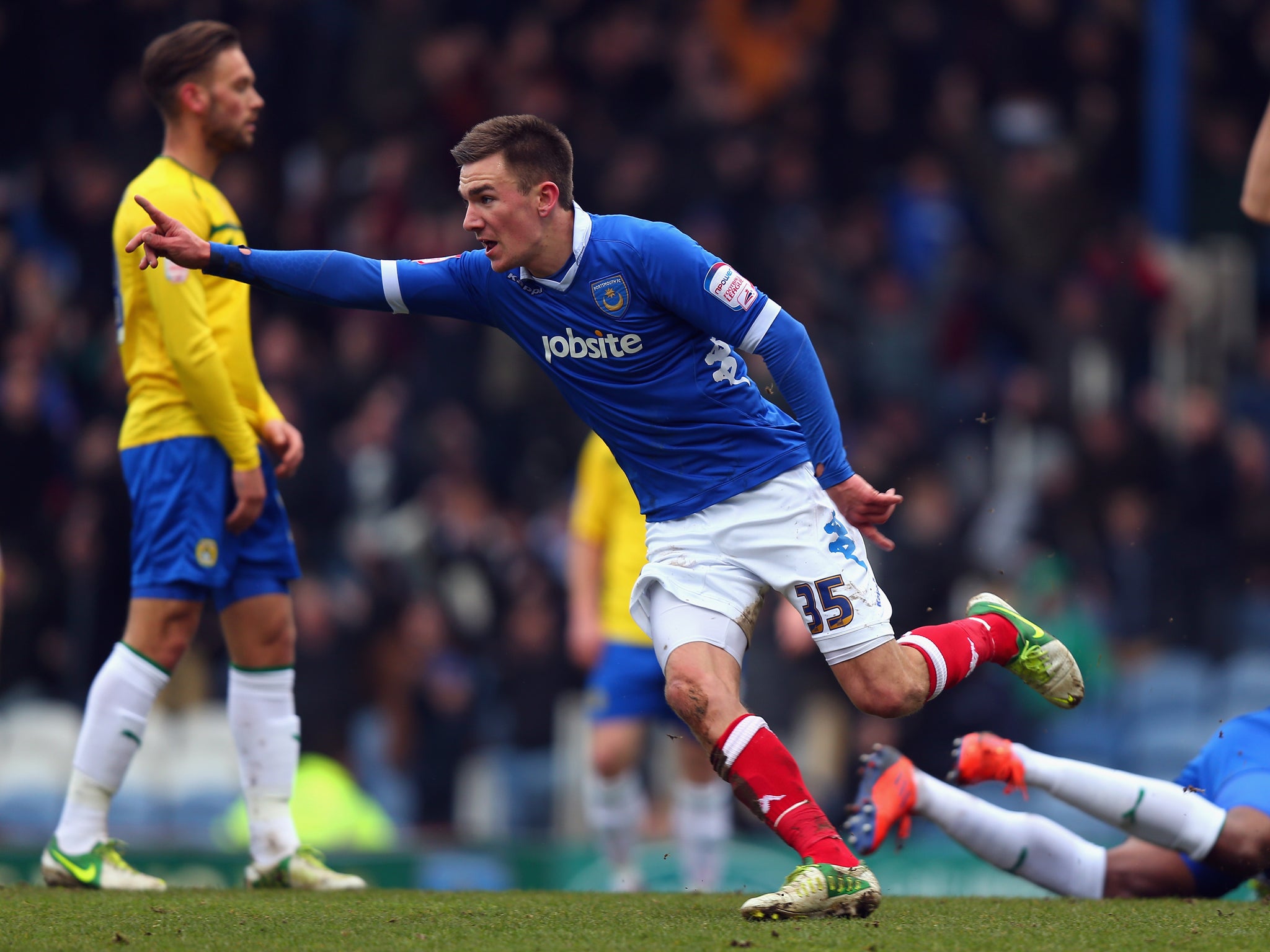 Jed Wallace celebrates scoring for Portsmouth