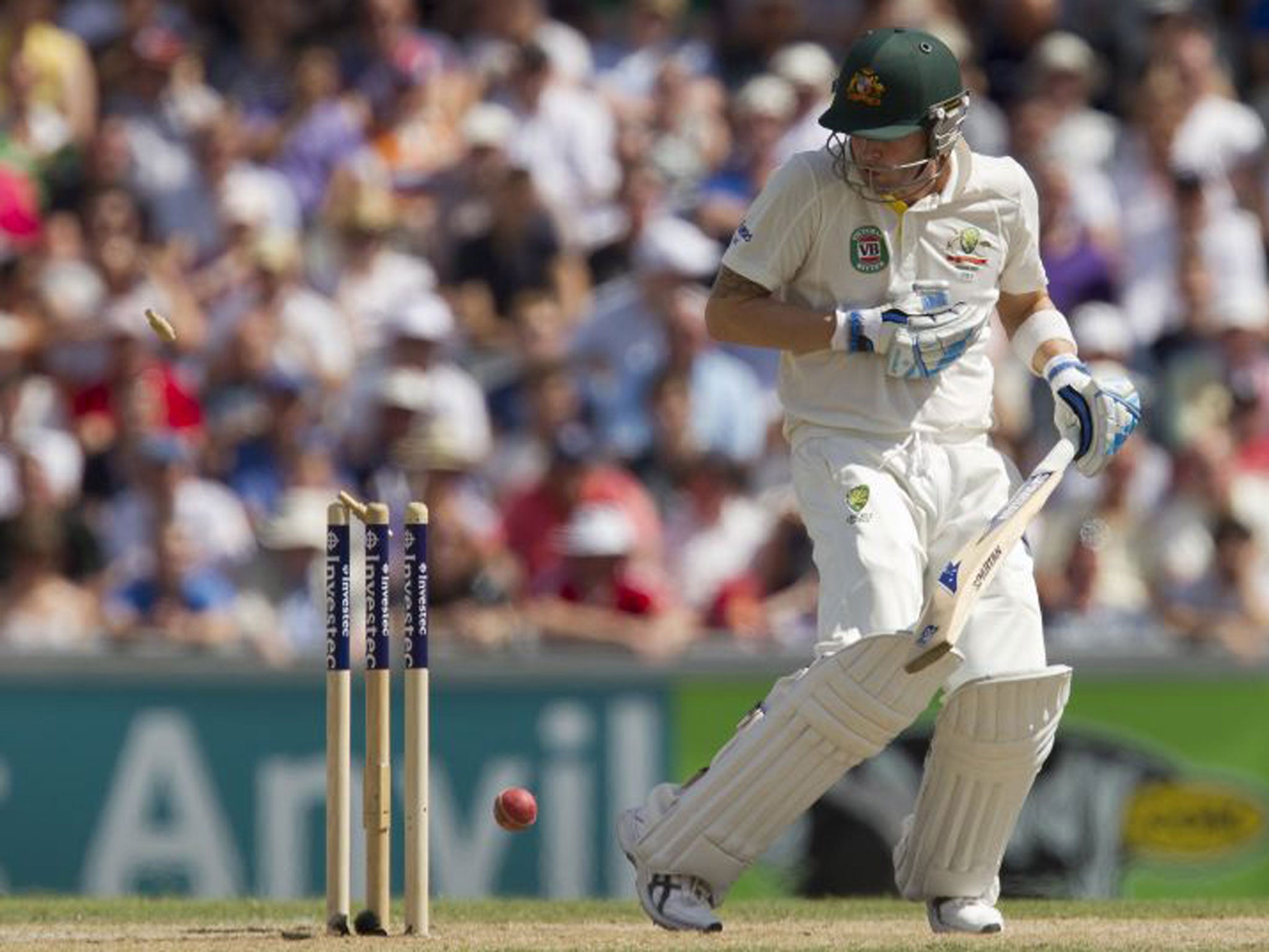 Michael Clarke reacts after he is bowled for 187 by Stuart Broad