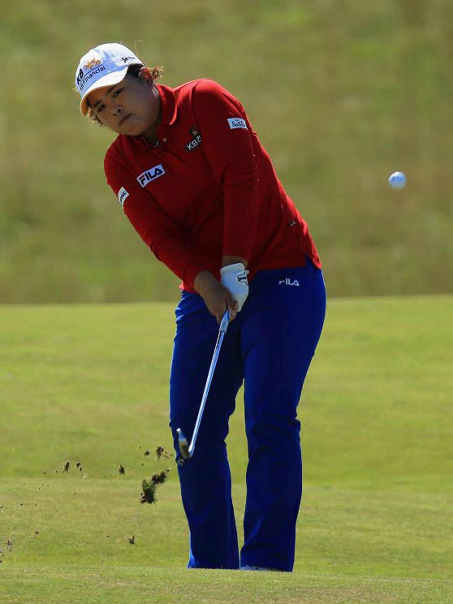 Inbee Park chips on the fourth hole yesterday