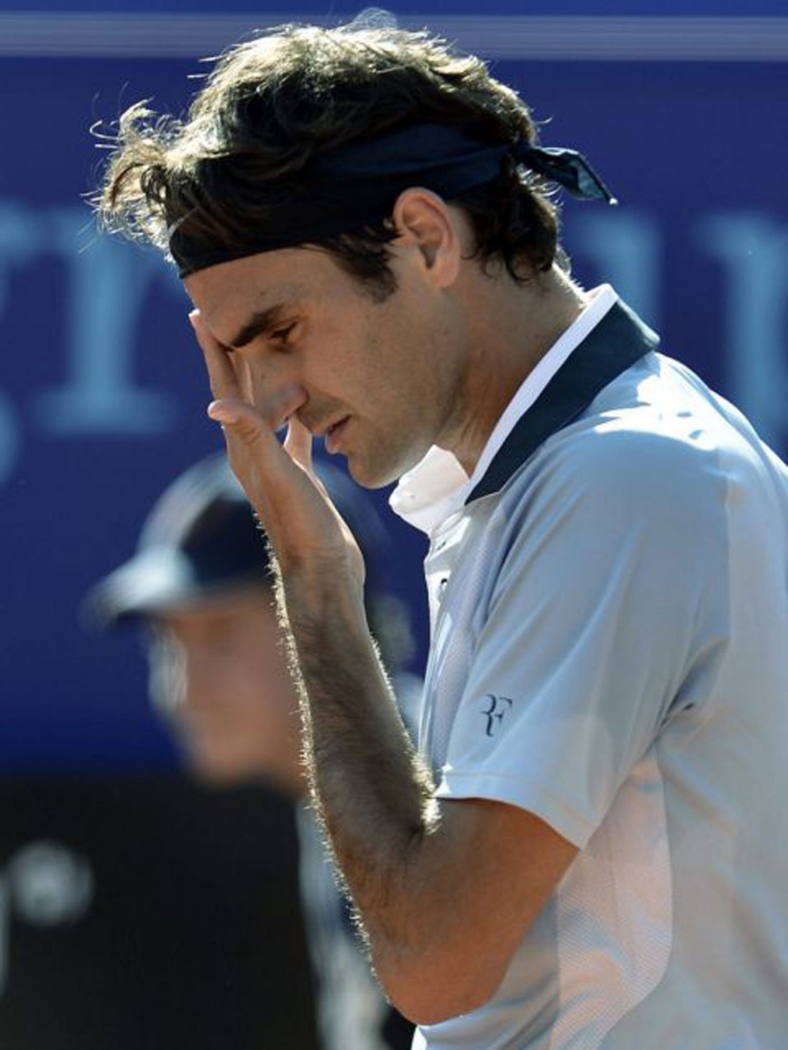 Roger Federer during his recent Swiss Open defeat against Daniel Brands