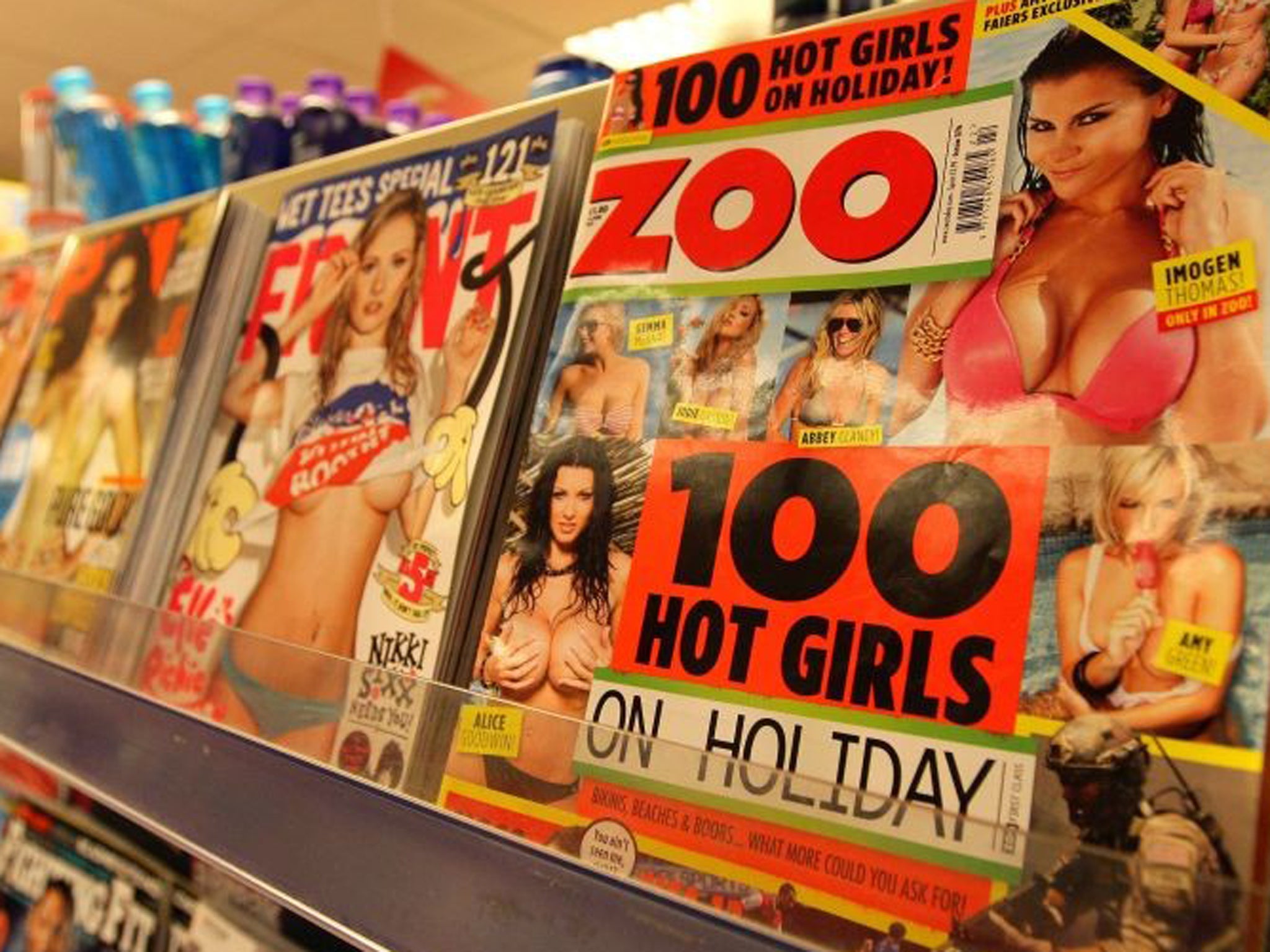 Tesco has struck a 'modesty deal' regarding the front covers of magazines such as Zoo, Nuts and Front and Bizarre will be supplied in a bag