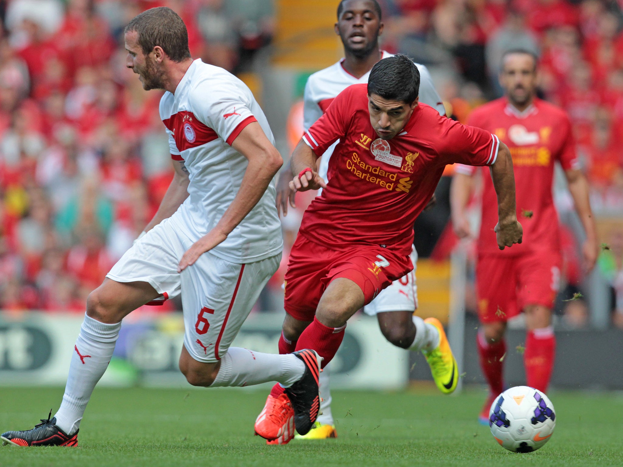 Luis Suarez in action during Steven Gerrard's testimonial as Liverpool take on Olympiacos