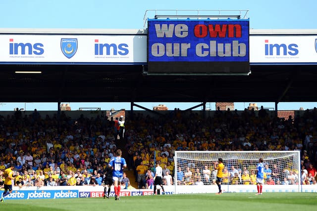 Fratton Park was full to capacity but Portsmouth supporters saw their fan-owned club crash to a heavy defeat