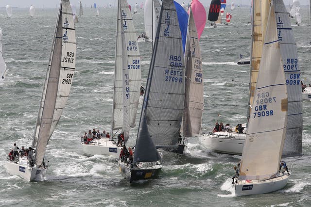 A jumble of J109s jostles for position approaching a mark rounding in the Solent on the second day of AAM Cowes Week.