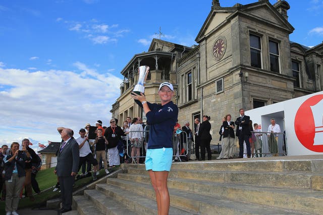Stacy Lewis shows off the Open trophy after her triumph